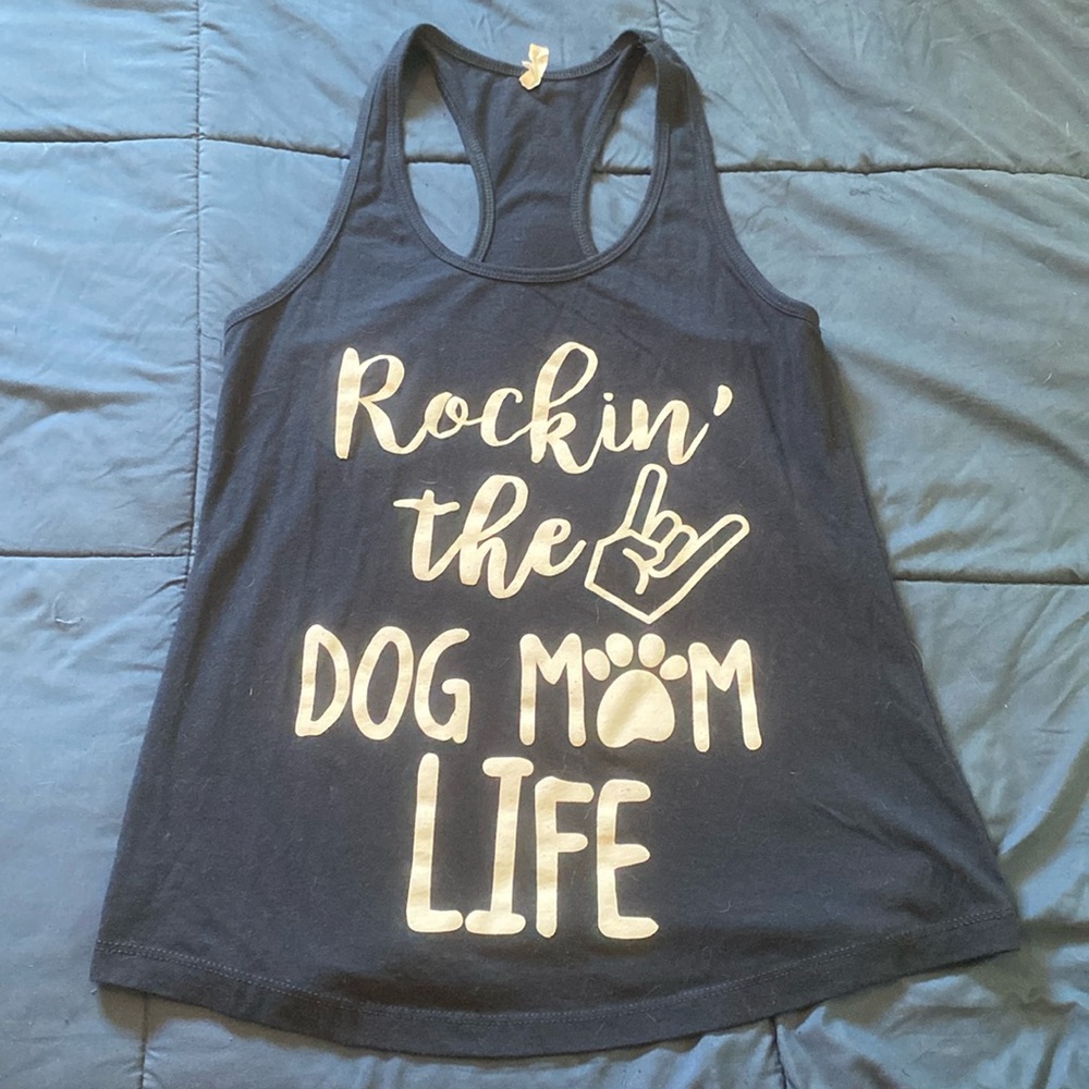 Never worn, “Rockin the Dog Mom Life” racer back tank. Runs small.
